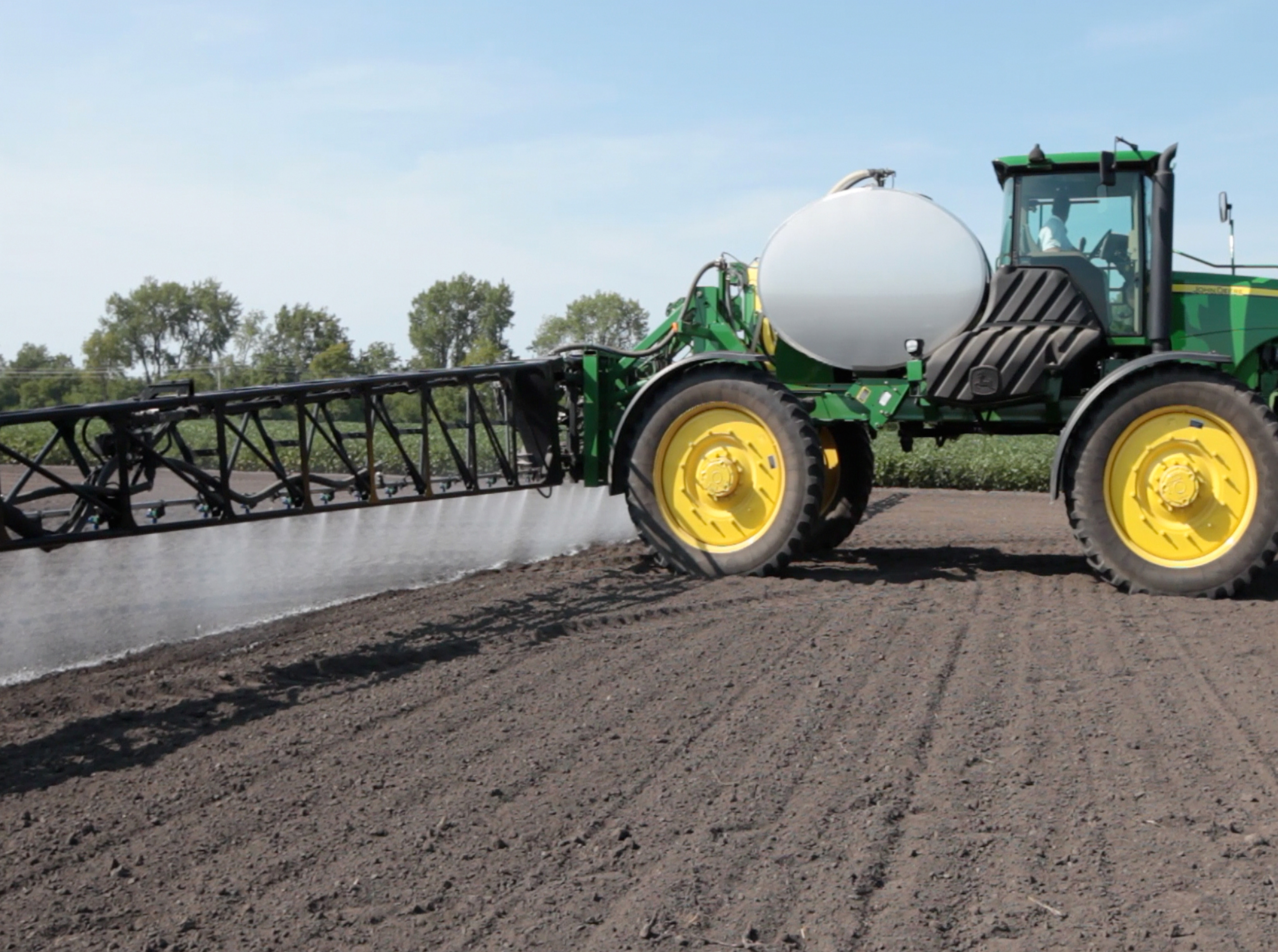 Long angle view end of sprayer arm